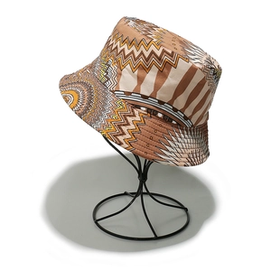 Detail of bohemian sun hat with ethnic geometric patterns on cotton fabric material