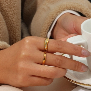 Irregular 18K gold plated stainless steel wave ring with cubic zirconia for women
