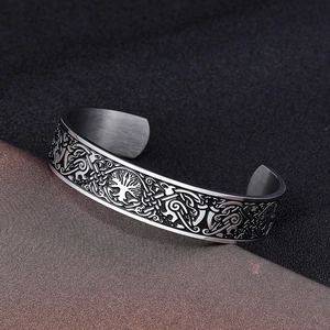 Vintage Viking stainless steel open cuff bracelet with Celtic embossed patterns on metal