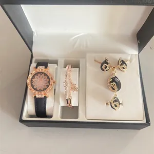 Women's rose gold watch and jewelry set including necklace, earrings, and ring in gift box