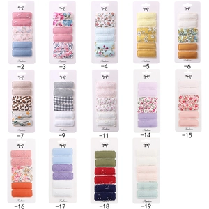 14-set of embroidered fabric BB hair clips with floral, plaid, and leopard patterns