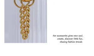 Macro detail of twisted gold-plated curb chain texture with vintage metallic finish