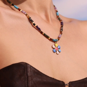 Colorful beaded necklace with rainbow flower pendant in Bohemian summer vacation style
