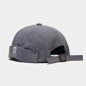 Dark gray docker cap with m embroidery and adjustable metal strap back for men and women