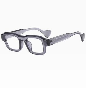 Detail shot of translucent gray square sunglasses showing model SN38009 and size on temples