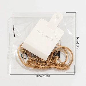 Golden snake chain necklace packaged in clear bag with measurement labels for size