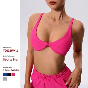 Women's shockproof ribbed sports bra in rose red with twist knot and thin straps