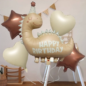 Detail view of brown dinosaur balloon with Happy Birthday print and foil stars