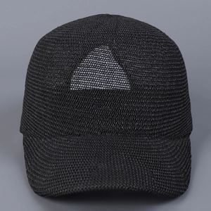 Detail of black breathable mesh baseball cap with honeycomb texture and curved brim