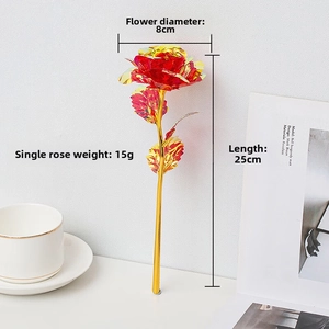 Detail view of red and gold foil rose showing 25cm length and 8cm flower diameter