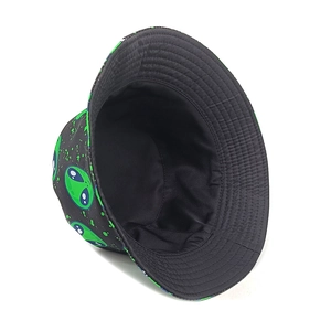 Reversible alien print bucket hat for men and women featuring green alien pattern on black