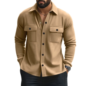 Detail of khaki slim fit men shirt jacket with chest pockets and black buttons
