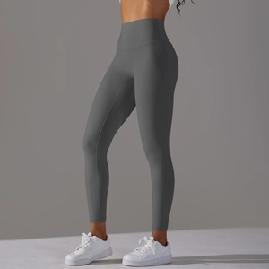 Rear view of high-waisted seamless charcoal yoga pants showing butt-lifting elastic fit