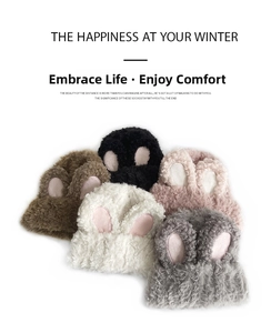 Close-up of soft plush knit hats with bunny ears in five colors for winter warmth