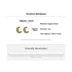 Detailed view of gold C-shaped earrings with cubic zirconia and exact dimensions