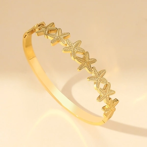 Chic gold stainless steel starfish open cuff bracelet with vintage textured starfish design