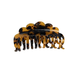 Elegant tortoise shell acetate hair claw clip with wavy double-row keel design