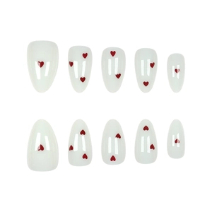 Minimalist almond-shaped fake nails with red heart patterns on glossy white base