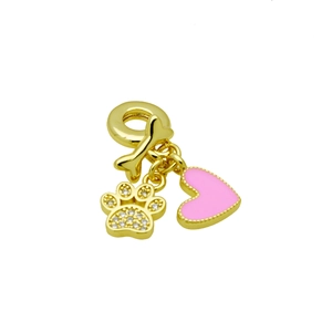 Detailed view of a gold-plated charm with a pink heart, bone, and sparkling zircon paw