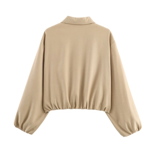 Back view of a khaki puff zipper jacket featuring a stylish elastic hem and cropped cut