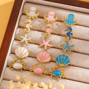 Marine life themed adjustable rings with colorful enamel starfish and seahorse designs