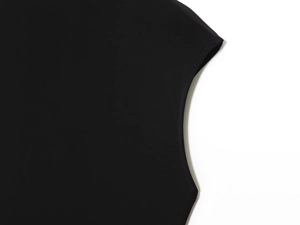 Detailed close-up of neat stitching and fine mesh texture on black maxi dress fabric