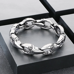 Punk style stainless steel crab claw link bracelet for men on a black jewelry box