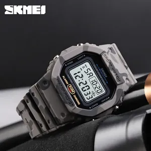 Digital sports watch with grey camouflage strap and LED square dial for outdoor activities