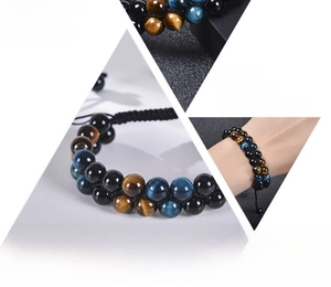 Macro detail of double-layer blue tiger eye and black onyx natural stone beaded bracelet