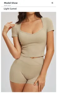 Detail of light camel yoga set with square neck slim top and V-waist fitness shorts