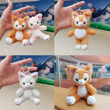 Detail of plush animal keychain charms featuring colorful space explorer character outfits
