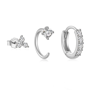 Detailed macro view of S925 sterling silver three-piece earring set with clear zircon stones