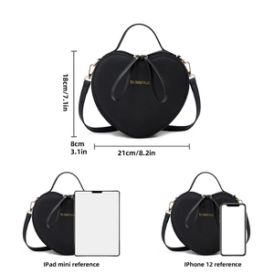Size comparison of the heart-shaped handbag with an iPad mini and a smartphone