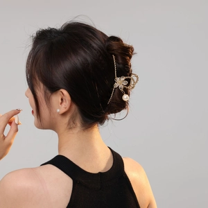 Golden flower hair claw clip with rhinestones and pearl pendant for women