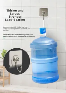 Detail of heavy-duty adhesive hook holding a heavy water bottle on a white tiled wall