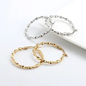 Minimalist twisted rope hoop earrings in gold and silver finish with latch back closure