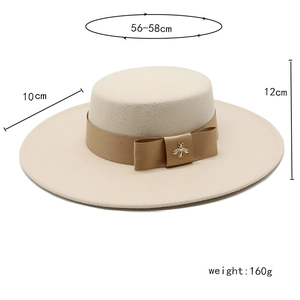 Beige wool felt flat top boater hat with 10cm wide brim and golden bee detail