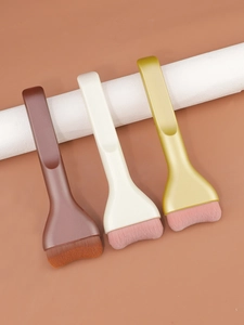Macro view of ultra-thin tongue-shaped foundation brushes with flat dense bristles