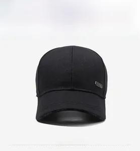 Detail of black cotton baseball cap showing metallic side logo and SPORTS brim embroidery