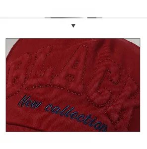 Detail of red cotton baseball cap with 3D embossed BLACK and New collection embroidery
