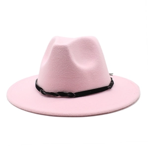 Detail of pink wool felt fedora featuring a decorative black braided hatband and texture