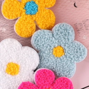 Set of four colorful chenille sunflower embroidery patches for DIY clothing decoration