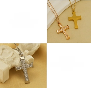 Three cross pendants in gold and silver set with white zircon on titanium steel chains