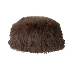 Thick brown faux fur bucket hat for women with warm plush texture and minimalist design