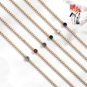 Detail of colorful round zirconia tennis bracelets in gold plating with various gemstone colors