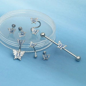 Blue butterfly piercing set including belly ring and ear studs with silver steel finish