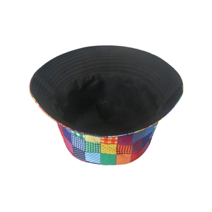 Colorful bohemian patchwork bucket hat with vintage rainbow paisley and plaid patterns