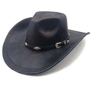 Close-up of black western cowboy hat featuring leather band with gold buckles and studs