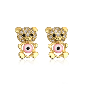 Close-up of 18K gold plated bear earrings with sparkling crystals and pink evil eye detail