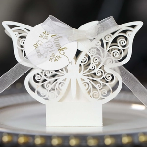 Detailed laser-cut butterfly gift box with white satin ribbon and thank you tag